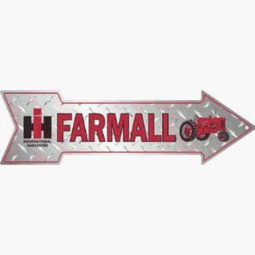 Arrow-shaped tin sign with a 'Farmall' logo and a red tractor illustration, set against a diamond steel pattern, reflecting a vintage farm aesthetic.