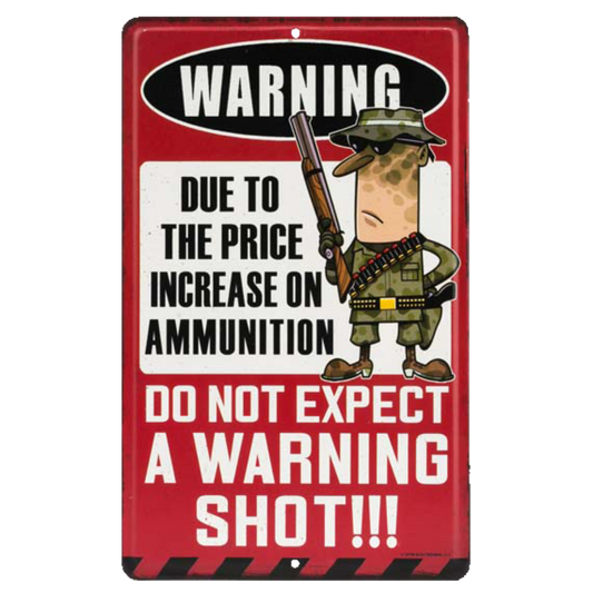 Cartoon-style tin sign with humorous warning about not expecting a warning shot due to ammunition price increase.