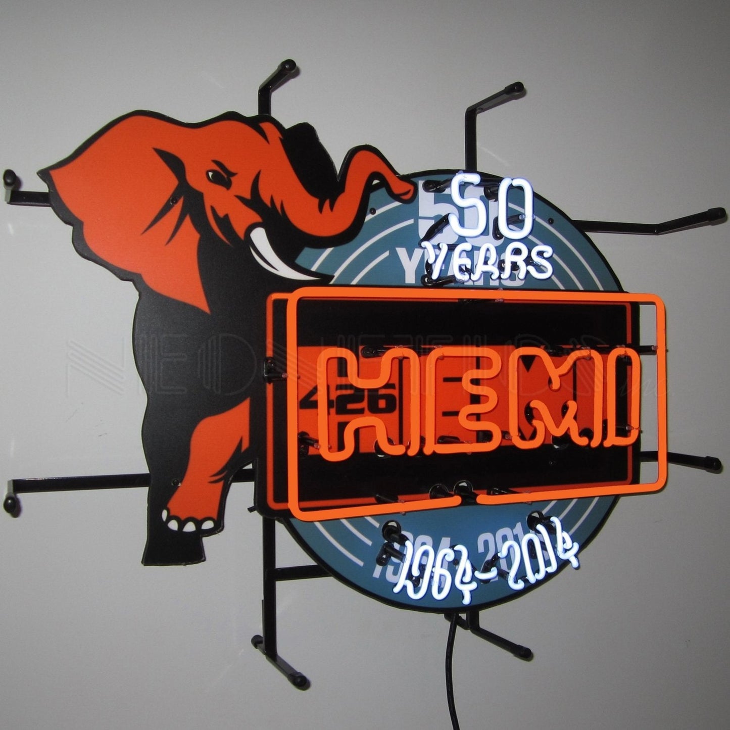 "Dodge Hemi 50th Anniversary" neon sign with an elephant and orange neon text