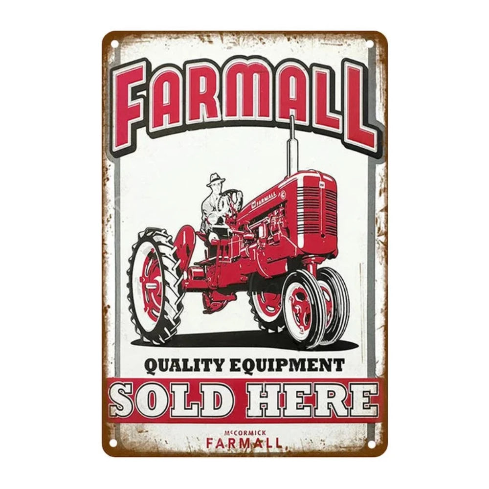 Vintage "Farmall Quality Equipment Sold Here" tin sign with an image of a classic red Farmall tractor and bold typography.