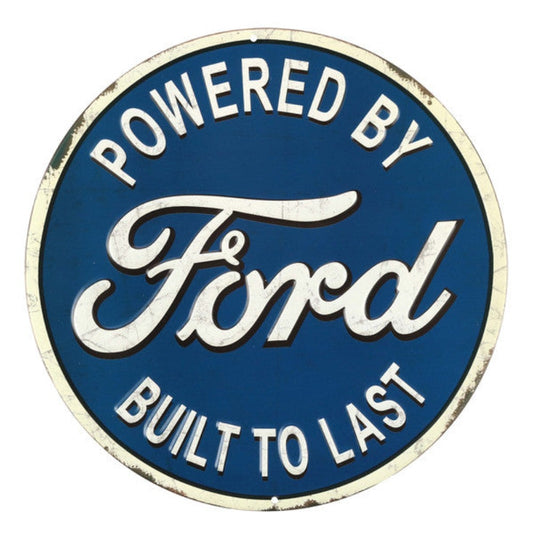 Vintage-inspired round embossed metal sign featuring the Ford logo with the words "Powered by Ford, Built to Last" in classic white lettering on a blue background.