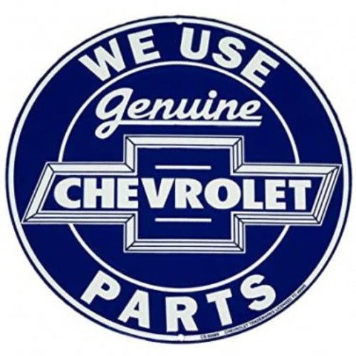 Circular blue tin sign reading "We Use Genuine Chevrolet Parts" surrounding a classic Chevrolet logo.