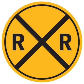Circular yellow tin sign with black "R X R" railroad crossing symbol.