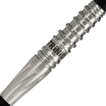 A closeup picture of the barrel of one of the Trinidad Pro Series Ivan Type 2 Darts. The barrel is silver in color with a polished finished. The barrel is also knurled. On the ridges of the barrel are what appear to be raised small half spheres. "Trinidad" is printed in black just below where the knurling starts, opposite from the shaft.