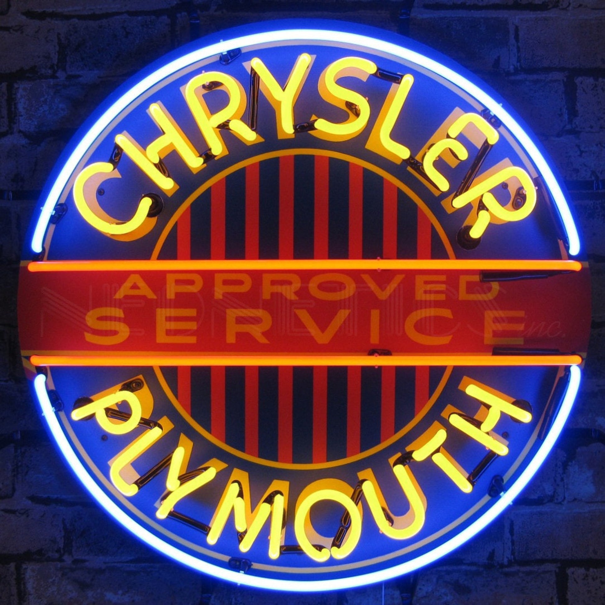 "Chrysler Plymouth Approved Service" vibrant neon sign.