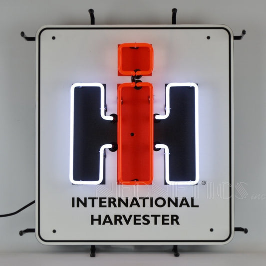 "International Harvester" neon sign with red and white lighting