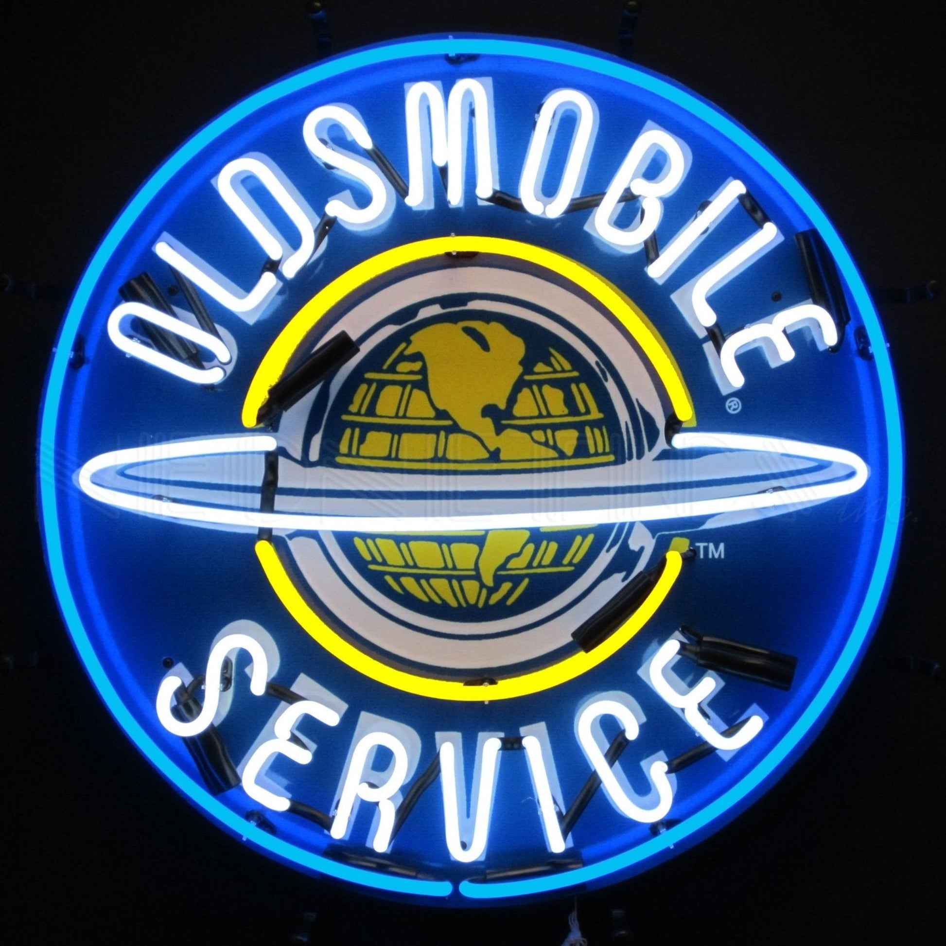 "Oldsmobile Service" circular neon sign with logo in blue and yellow.